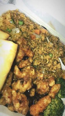 Vegetable fried rice lunch combo with general Tso's chicken.