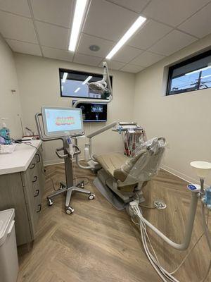 One of our 6 treating rooms. We have the latest technology offered, including Cone Beam CT and digital scanning.