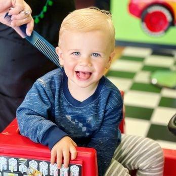 Happy happy boy after his first cut!