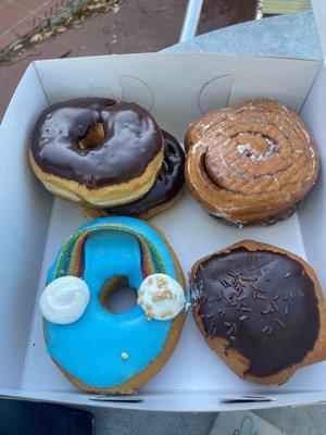 St Patrick's Day donut, boston cream, chocolate frosted, blueberry cake