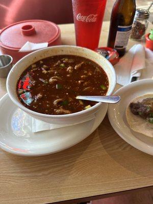 Menudo with a barbacoa taco on the side. Don't forget the Ultra to wash it down