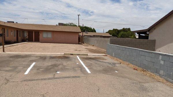 No room to park ANY vehicle up AGAINST the wall without damage.