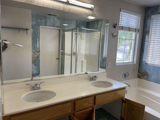 Before pic of primary bath countertop and sinks