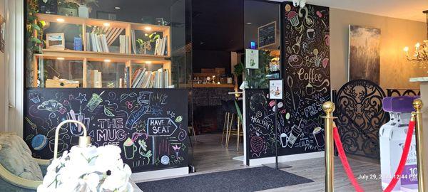 Outsife of cafe, inside of building with Magnolia Wellness Center