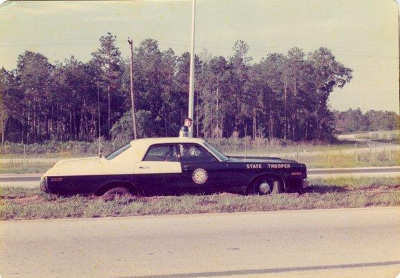 We do try harder...this trooper got stuck while pushing out an elderly person. He could afford the embarrassment .