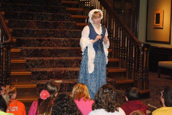 Museum theatre students present historical interpretive programs to children.