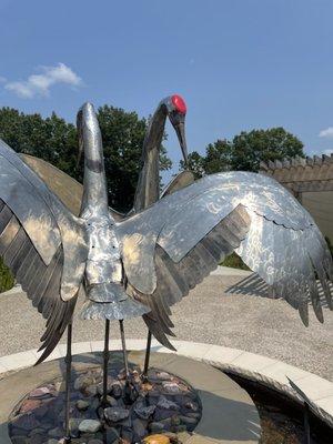 Beautiful crane sculpture and fountain near the end of the loop