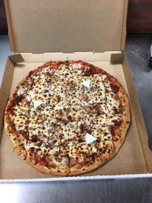 This is our supreme party pizza it's supremely delicious and alot of pizza at a fair price! This is a thin crust we offer deep dish too