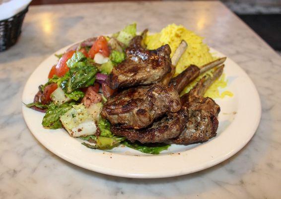 Seasoned Lamb chops grilled to perfection with their house salad and saffron rice!