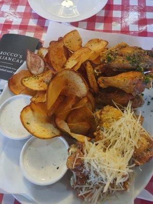 Parm and lemon pepper wings with their homemade chips