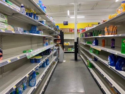 Empty shelves through the store