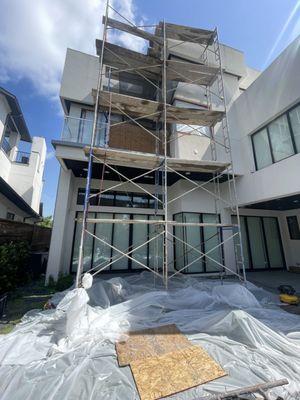 TPO Roof Leak and Damaged stucco.