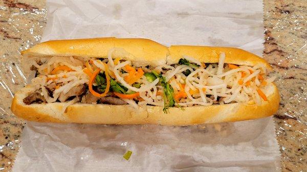 Grilled pork banh mi with vegetables. This was the last of the vegetables. Only enough for 2 sandwiches. We had extra from another place.