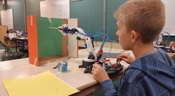 Using robotic arms they built themselves to paint a colorful masterpiece :)