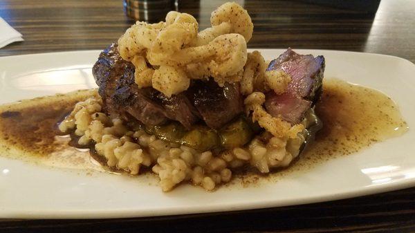 "Baseball" steak with farro, acorn squash and cispy mushrooms on top $19