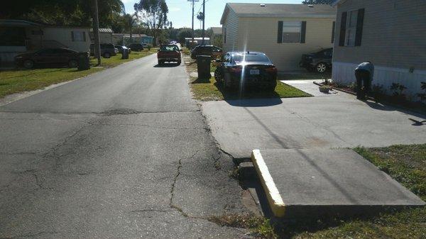 Look she parked on the grass and a illegal Mexican working on her yard now if that's not breaking the rules what is