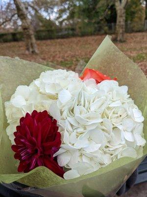 Two hydrangeas, a dahlia, and a rose bouquet