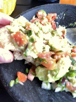 Fresh fried pork skin with guacamole