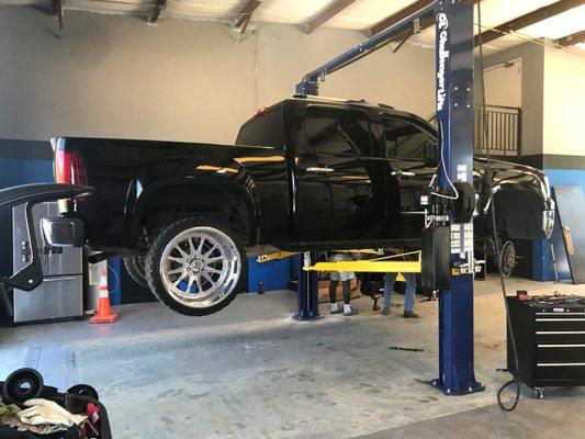 Wheel alignment on this GMC and reset the rear axle position.