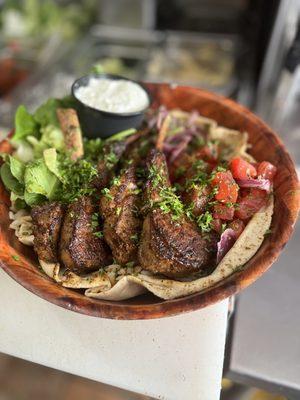 Lamb chop bowl served over rice