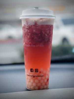 Strawberry green tea with popping yogurt boba