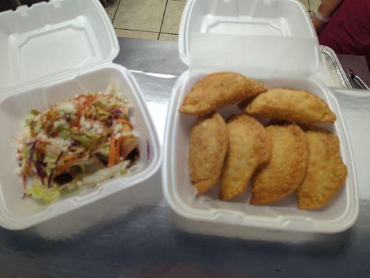 Beef, chicken, and ham empanadas with a fresh salad.