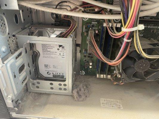 PC Cleaning. Image is a PC from here in NM. Dust, hair and fibers build up and make your PC work harder.