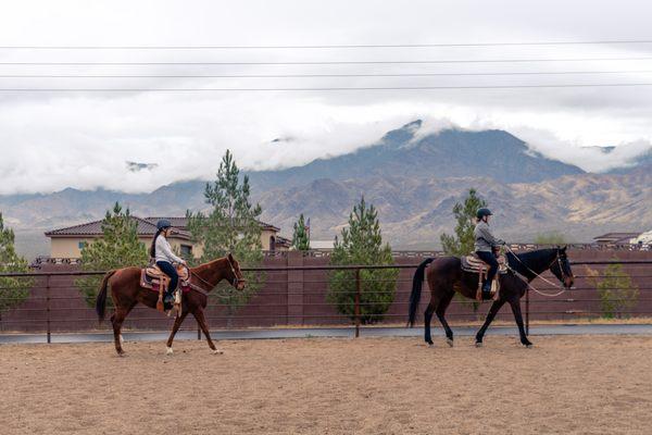 Horseback riding in the arena