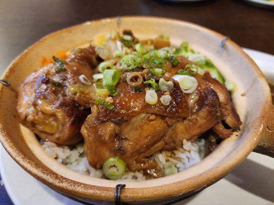 Clay Pot Chicken - dark meat chicken, white rice,  cucumbers,  carrots, and lettuce.