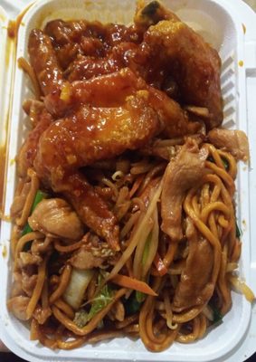 Lo mein and garlic chicken wings.