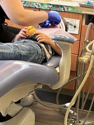 My son with the gas getting those cavities filled