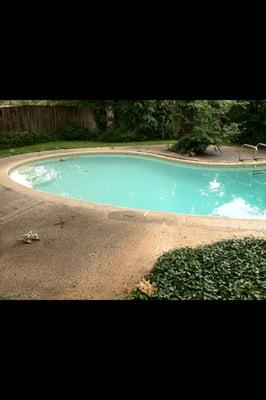 Before photo of our soft wash pool surface cleaning