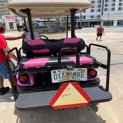 Golf cart day of rental before leaving property with employee on left driver's side.