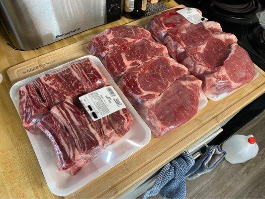 2-inch thick ribeyes (12lbs whole) and beef short ribs.