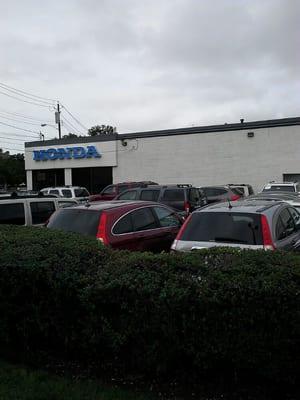 Lots of USED non-Honda automobiles congesting the parking lot, leaving no room for CUSTOMER parking.