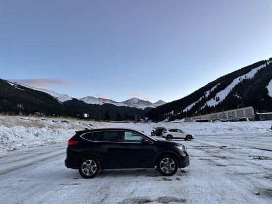 Parking lot with shuttle to ski village