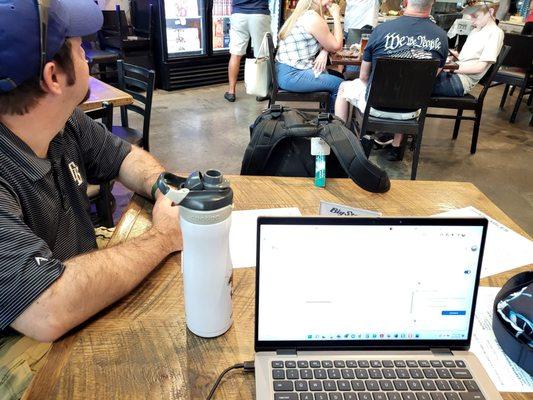 Space for laptops. Husband for scale .