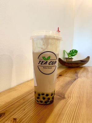 Mango milk tea with crema and boba