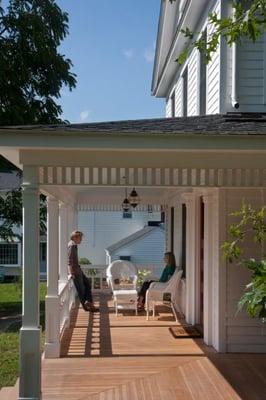 Enjoying the afternoon sun on the front porch with views of West Rock.