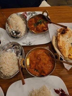 Butter chicken,  vandaloo, garlic naan, and basmati rice!