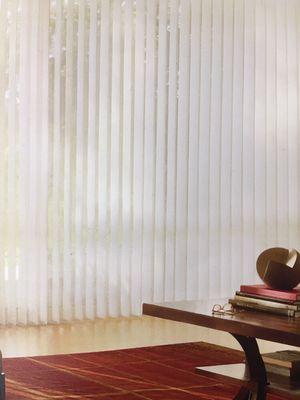 Hunter Douglas Stria Luminette Privacy Sheers in a family room.