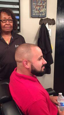 High short bald fade with beard trim shape up.