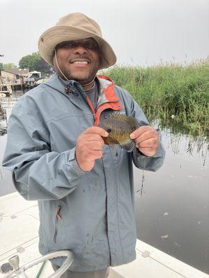 Big bluegill from Lake Saint Clair fishing with a leaf worm under a bobber.