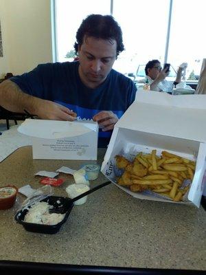 Enjoying fresh fried fish from the fish market at Big Y.