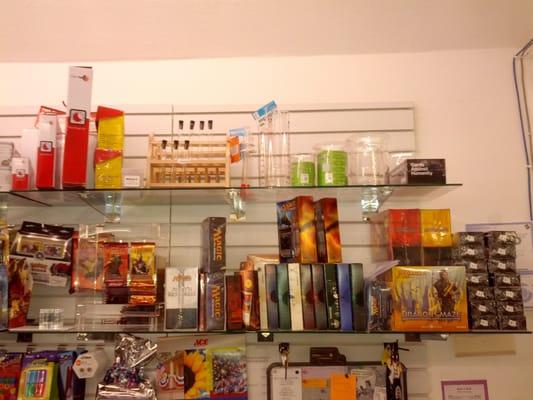 Magic: The Gathering cards and glass science supplies