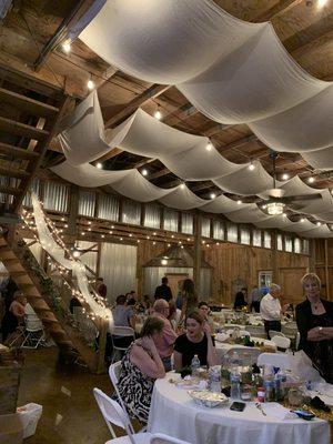 Barn holds 140-160 people depending on tables. Cozy and intimate.