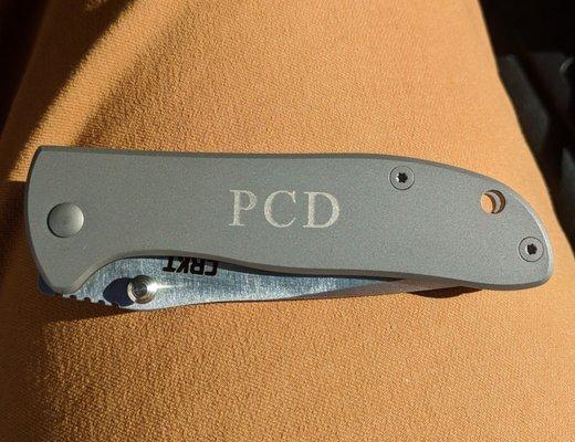 Here's a picture of one of the knives they engraved for me.