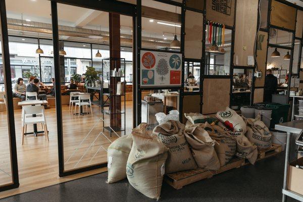 Looking into the cafe from the roastery.