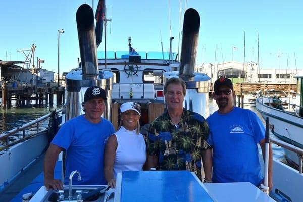 The Silver Fox crew - Captain Dave, Gayle, Captain Chris, and Jeff