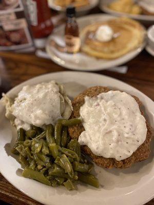 Chicken fried steak mashed potatoes and gravy